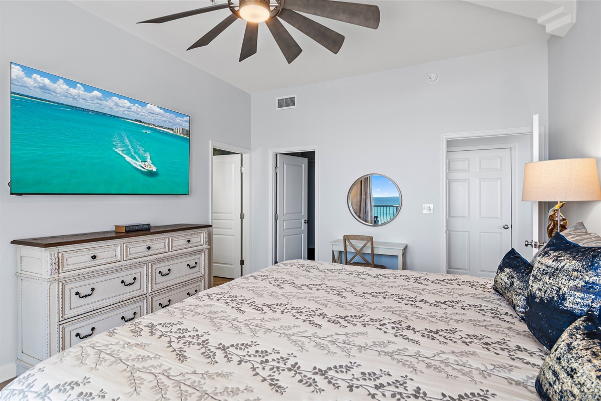Master bedroom with wall‑mounted Smart TV