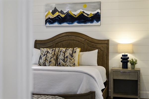 Comfortable bedding and extra pillows to create a dreamy night's sleep