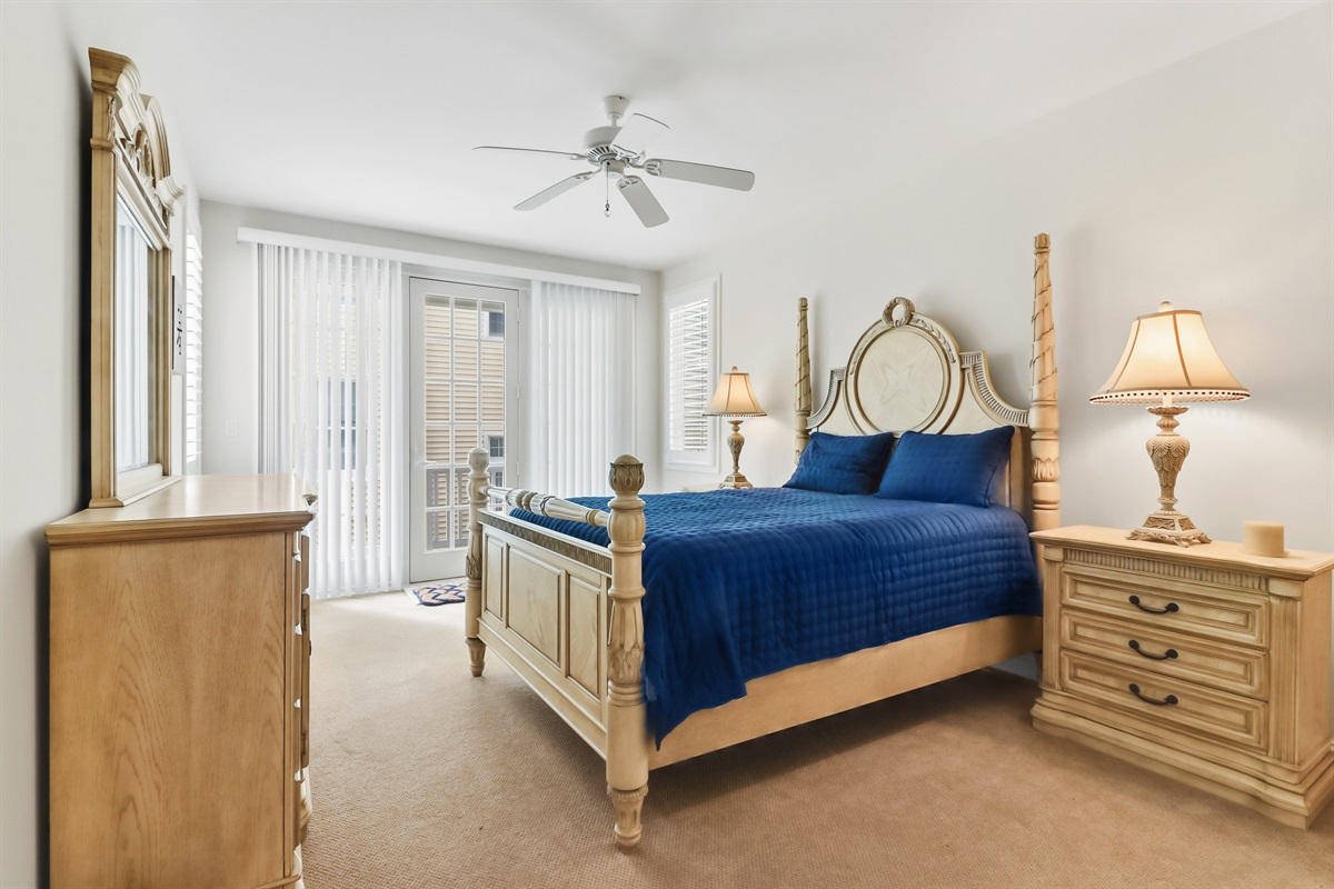 Queen sized bed with access to shared deck