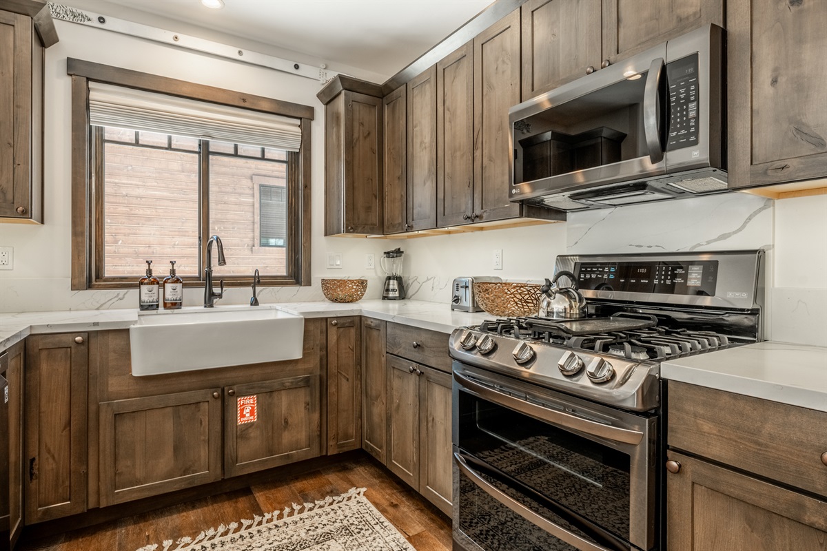 Thoughtful details shine in the kitchen, from the clean-lined sink to the well-placed oven—designed to make everyday cooking feel simple and enjoyable.