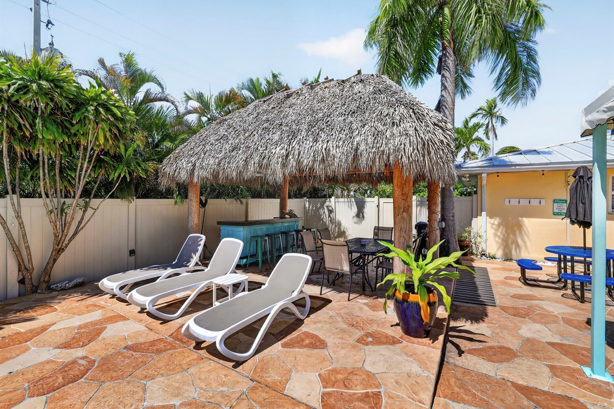 Tiki hut with bar and pool