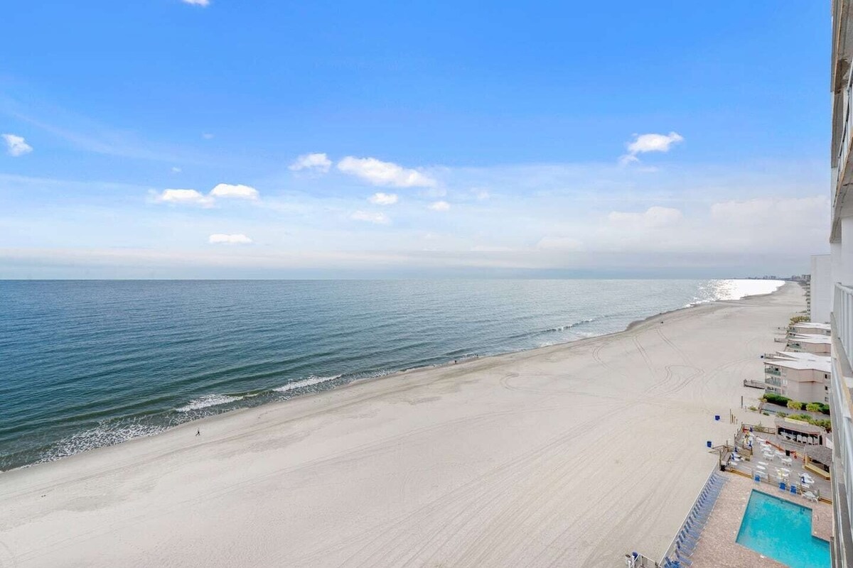 This incredible end-unit features expansive ocean views from both the master bedroom and the living room.