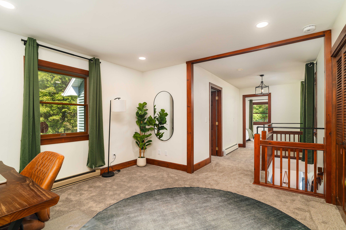 🚪 Third-floor landing — bedrooms spread out so families aren't stacked on top of each other.