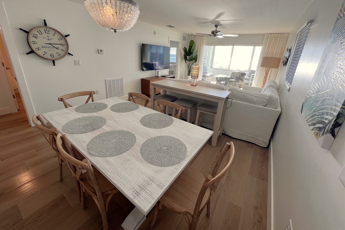 Dining for six and view of the beach and Gulf