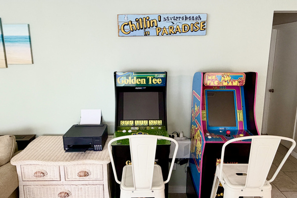 Old school arcade machines for the family's enjoyment when taking a break from the beach. Golden Tee 2K is a family favorite!!
We also have a setup for work and maybe print a needed document.