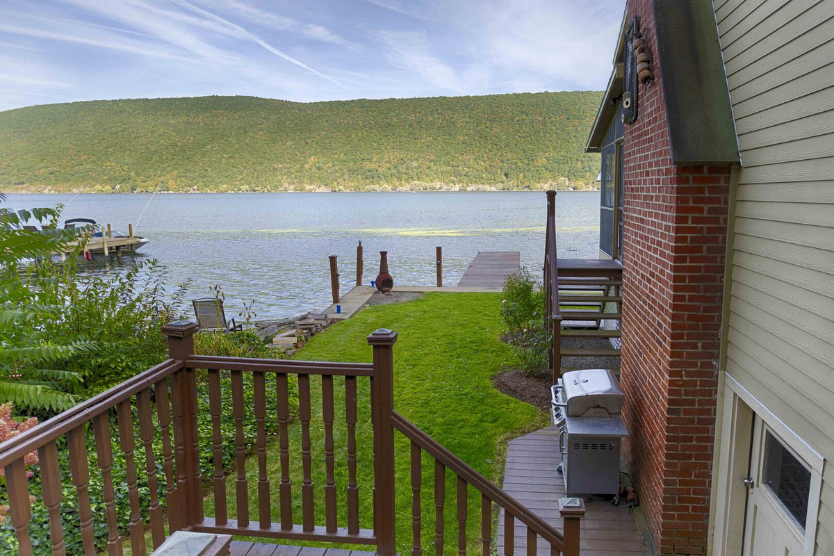 Experience the ultimate in lakeside living with this stunning lakefront property. Nestled along the water’s edge, this home offers unobstructed, panoramic views of the serene lake, creating a tranquil atmosphere that is perfect for relaxation and rec