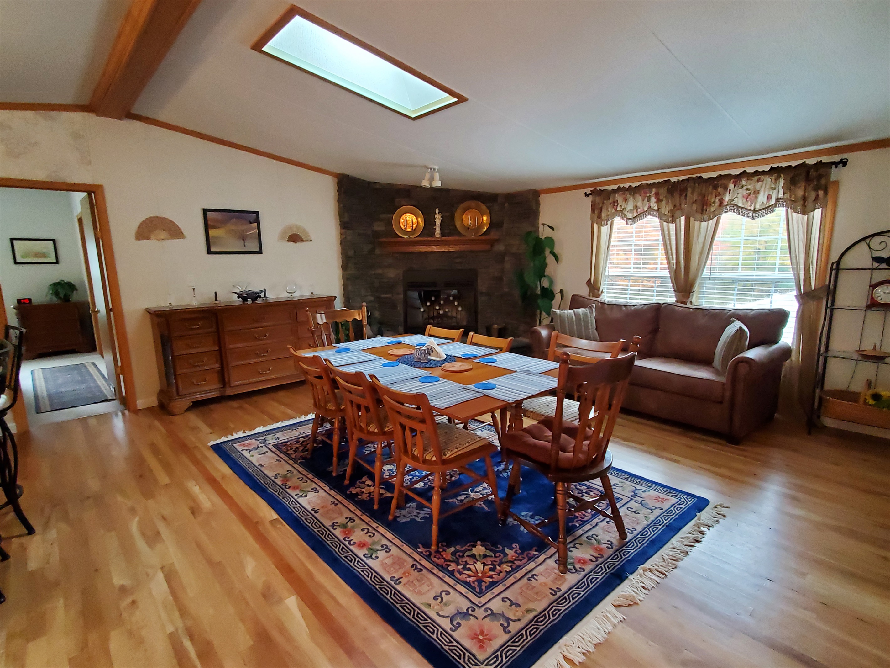 Great room has dining and seating