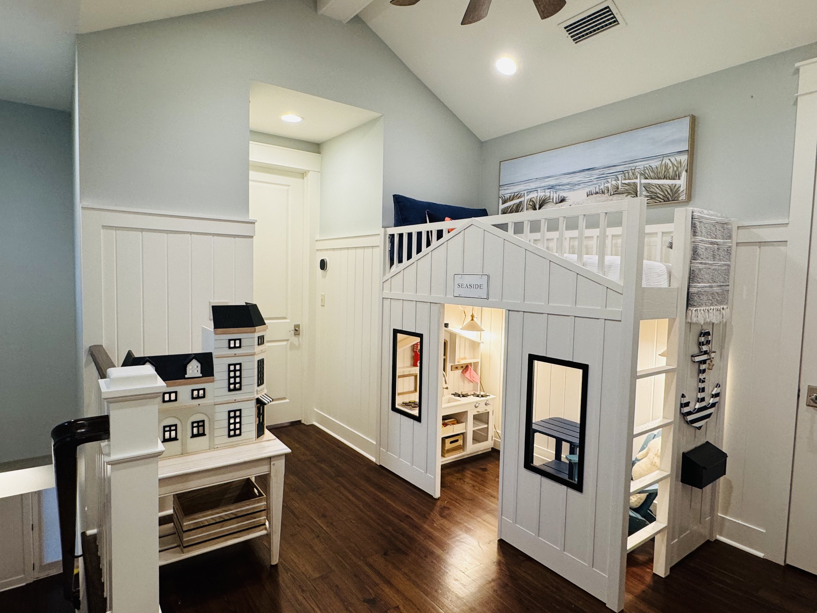 Playhouse bunk and imaginative play loft—perfect for little guests.