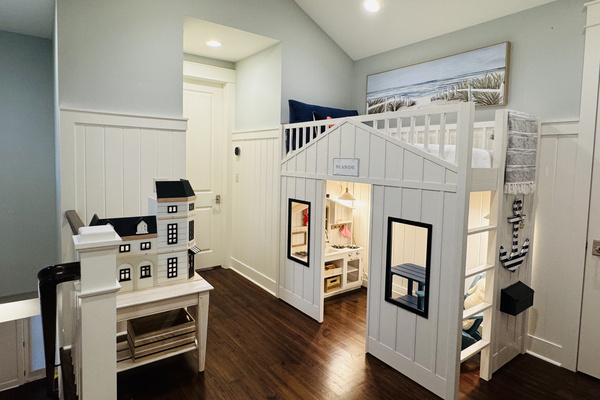 Playhouse bunk and imaginative play loft—perfect for little guests.