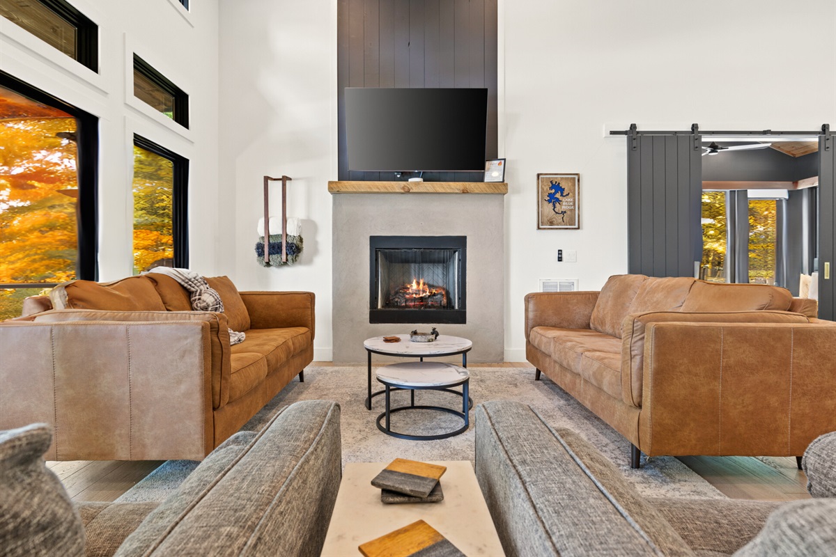 The living room&rsquo;s comfortable seating and warm tones create a cozy spot to unwind after a day of exploring.