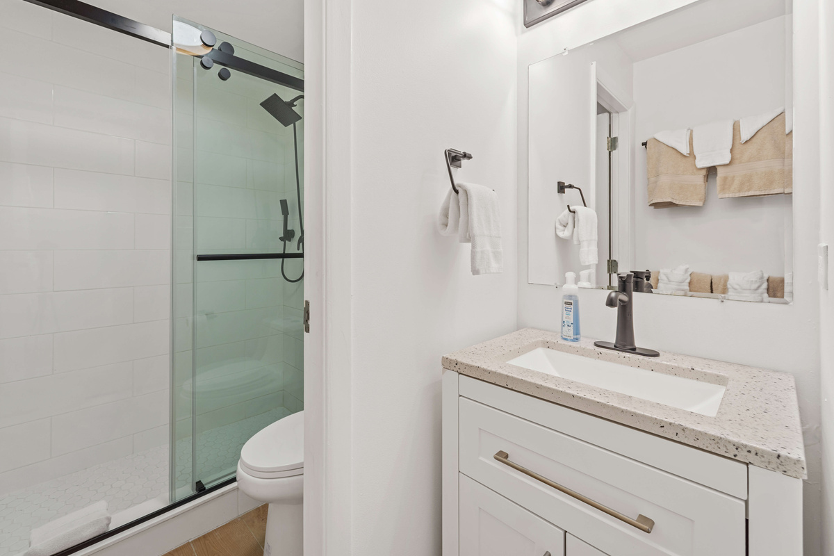 A separate vanity area allows one person to get ready while another person is showering