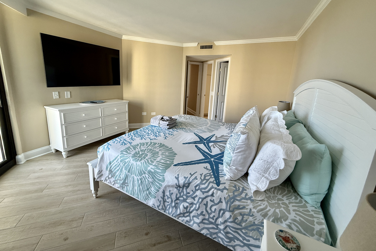 Primary Bedroom with King Bed and 65" Smart TV