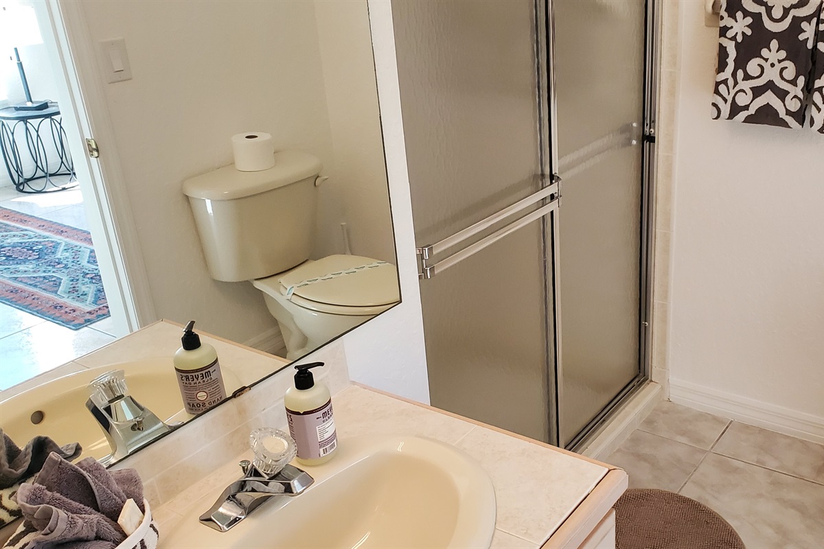 Twin private bathroom with walk in shower