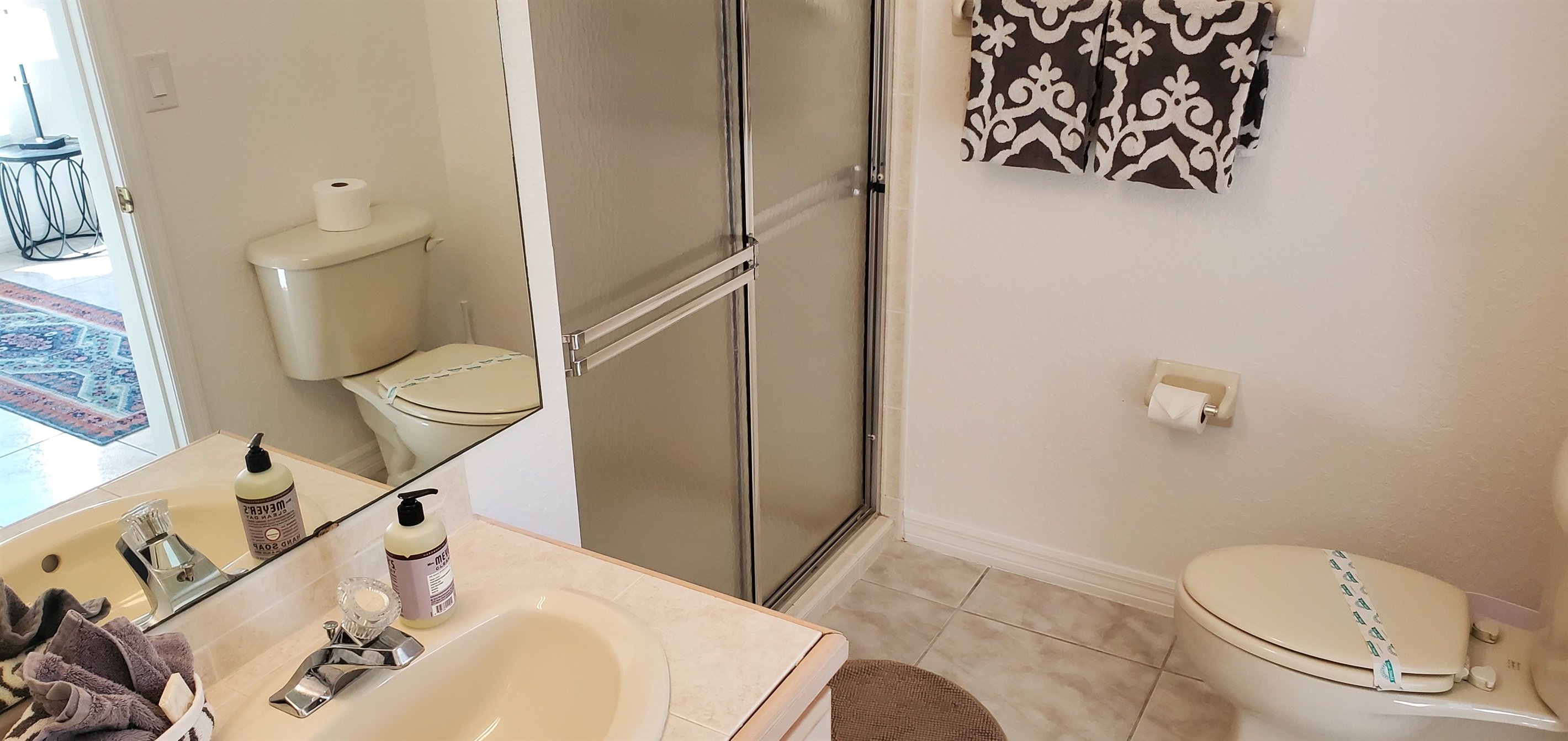 Twin private bathroom with walk in shower