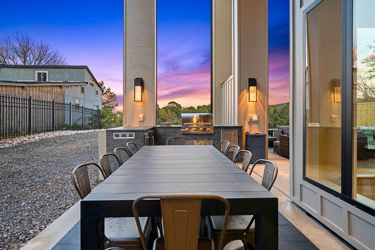 Enjoy meals together at this spacious outdoor dining table with these stunning views.