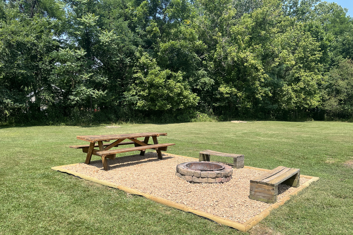 Newly added fire pit area with picnic table