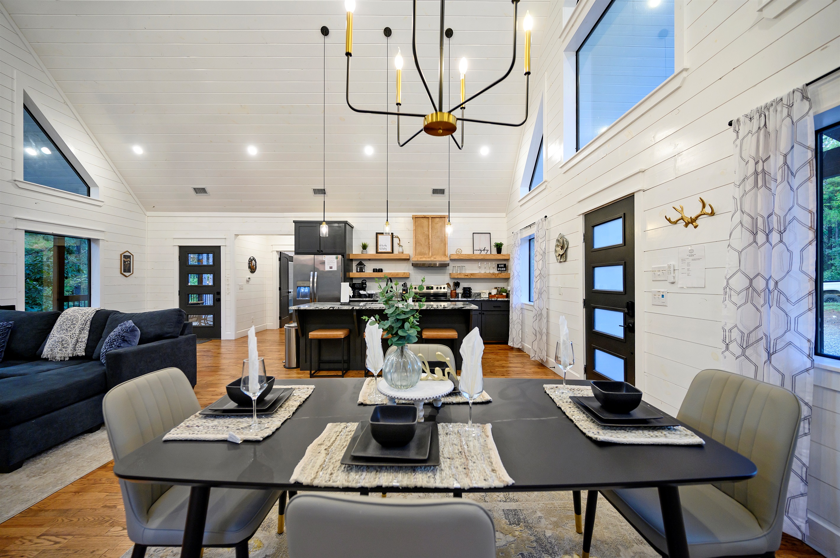 This is where good food, great company, and cozy vibes come together. The open layout blends a modern kitchen, stylish dining area, and chill living room—perfect for sharing meals, laughs, and laid-back moments. Your getaway just got an upgrade!