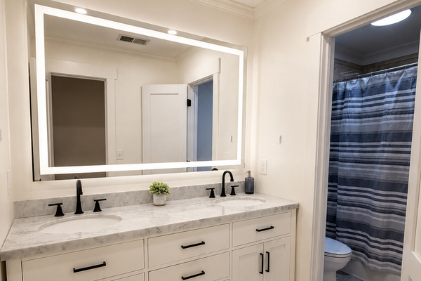 Spacious main bathroom with double sinks