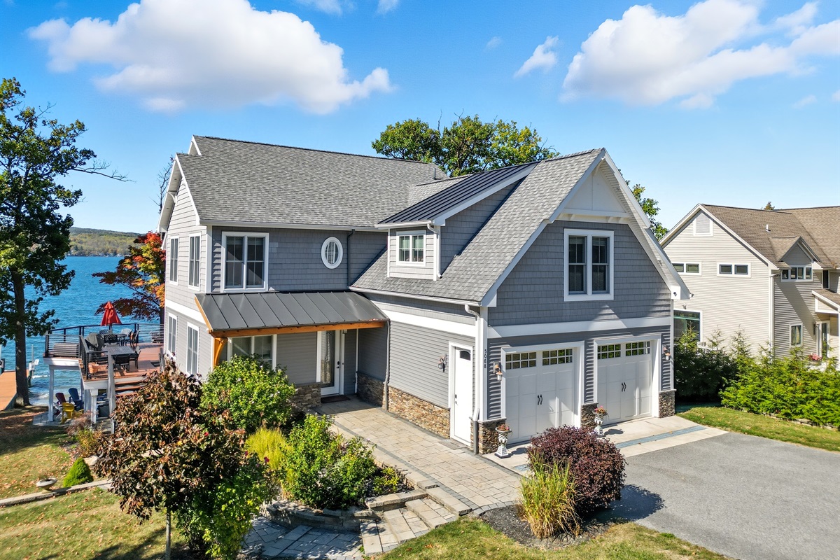Modern lakefront home with timeless charm! 