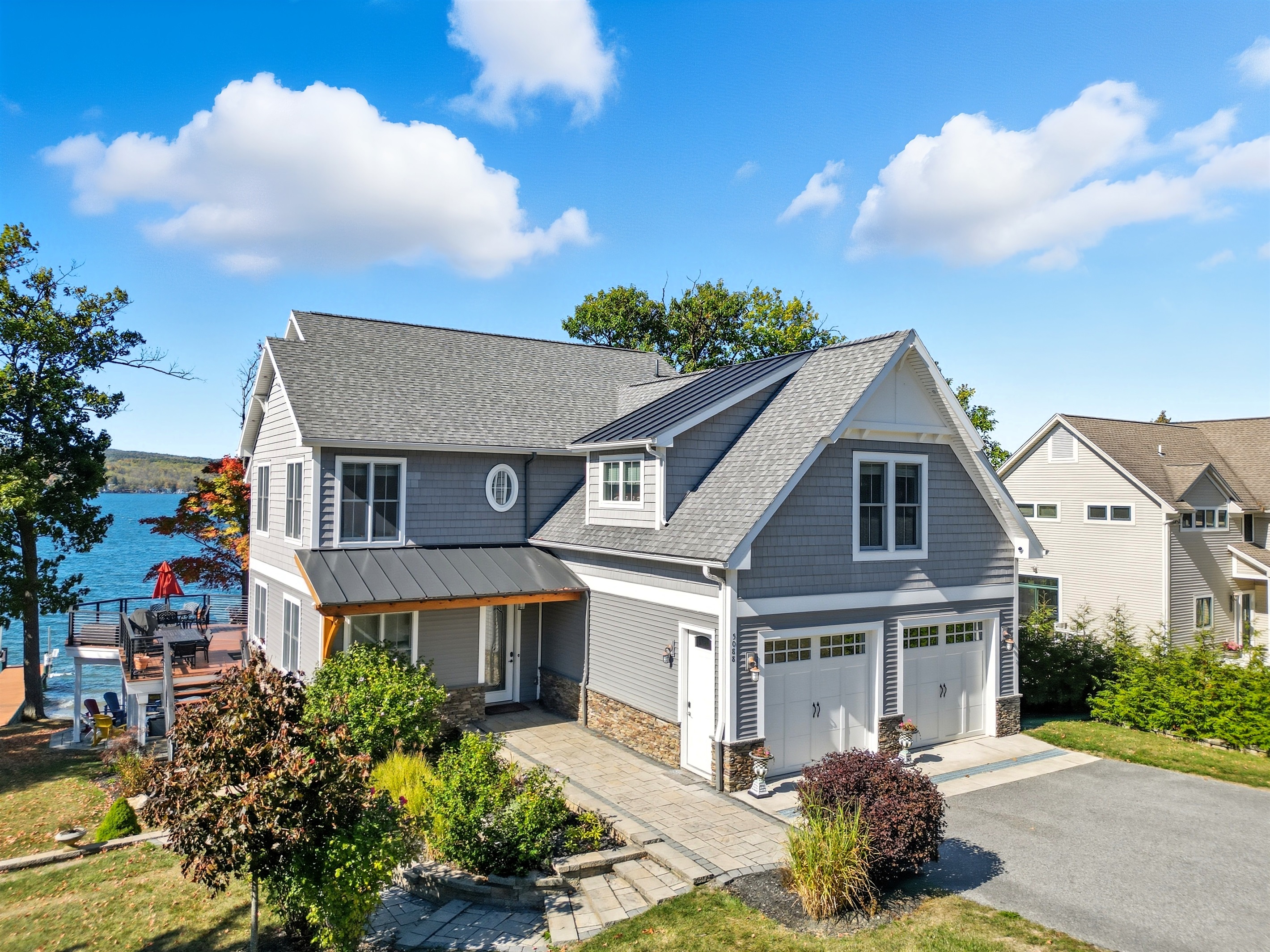 Modern lakefront home with timeless charm! 