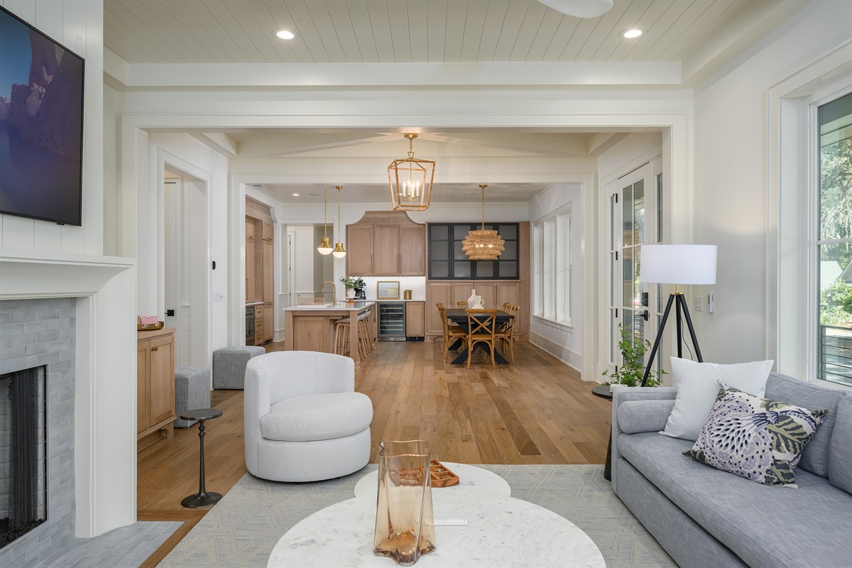View of main floor living, dining room, and kitchen