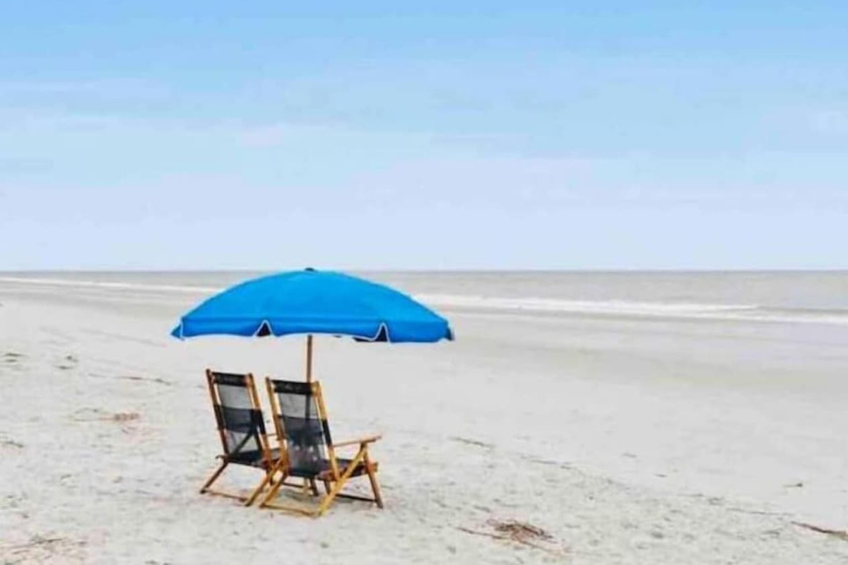 Beach chairs and umbrella