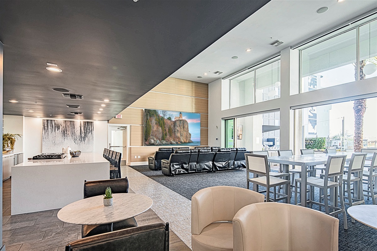 Luxe cinema lounge with plush recliners.