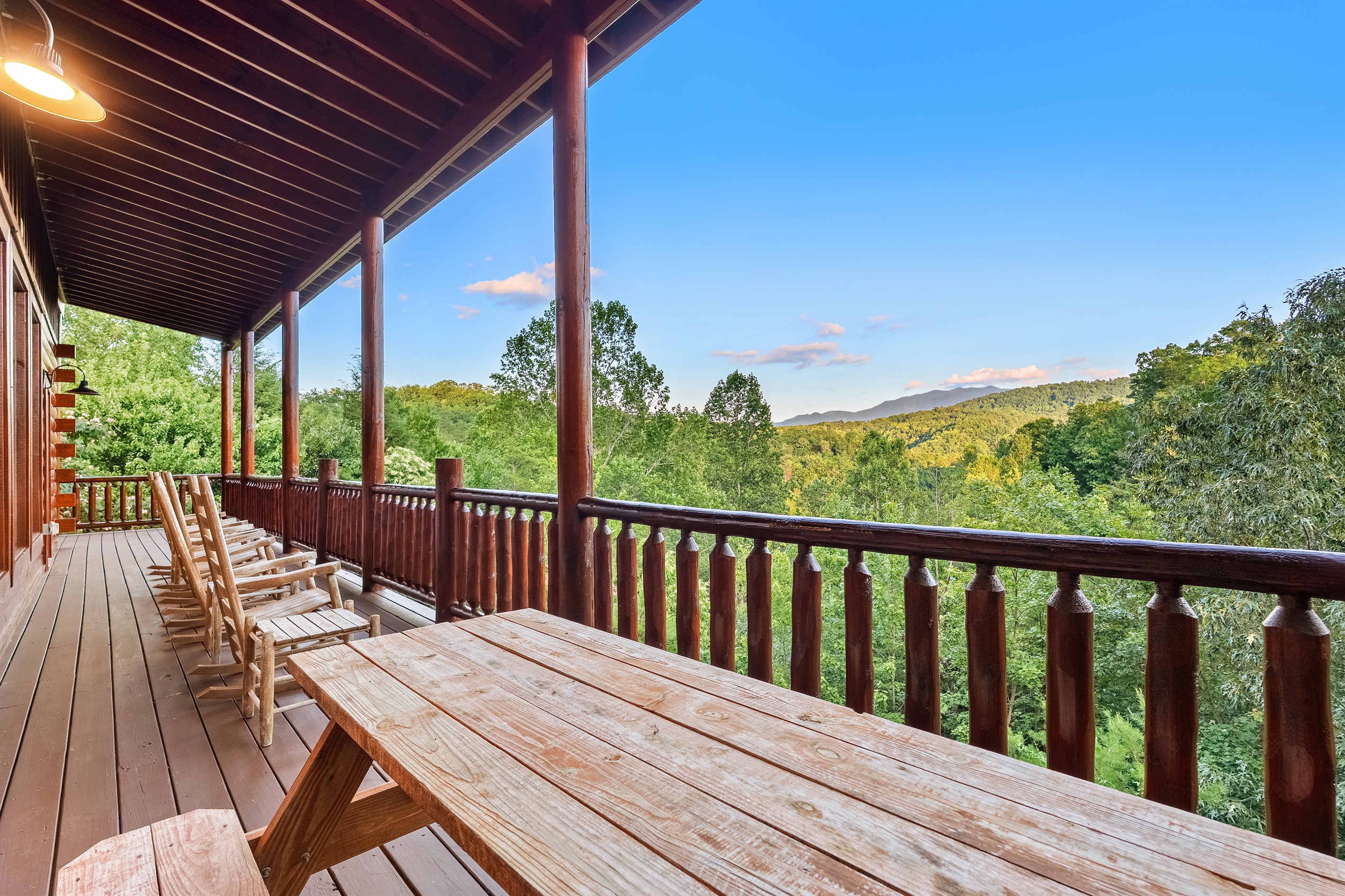 Cuddle up with a cup of coffee or glass of wine on the sprawling back porch!