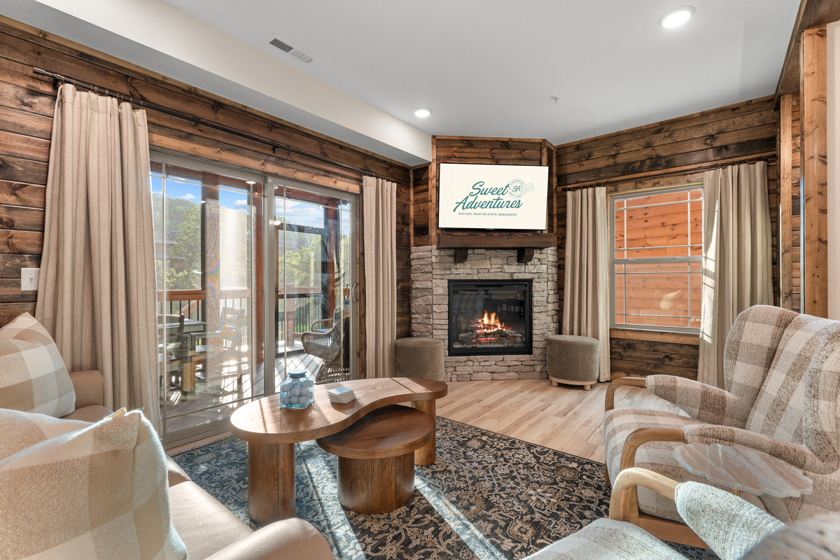 Cozy up to the stone electric fireplace with a movie on the smart TV after a day of adventure.