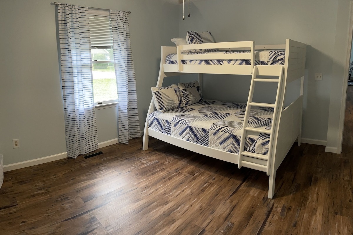Bunk beds- you need to pass through this room to get to other 2 other bedrooms