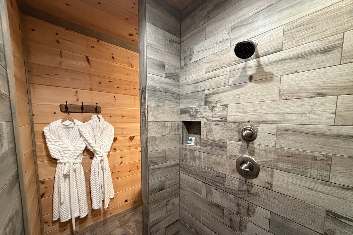 Downstairs Master bath with robes waiting.