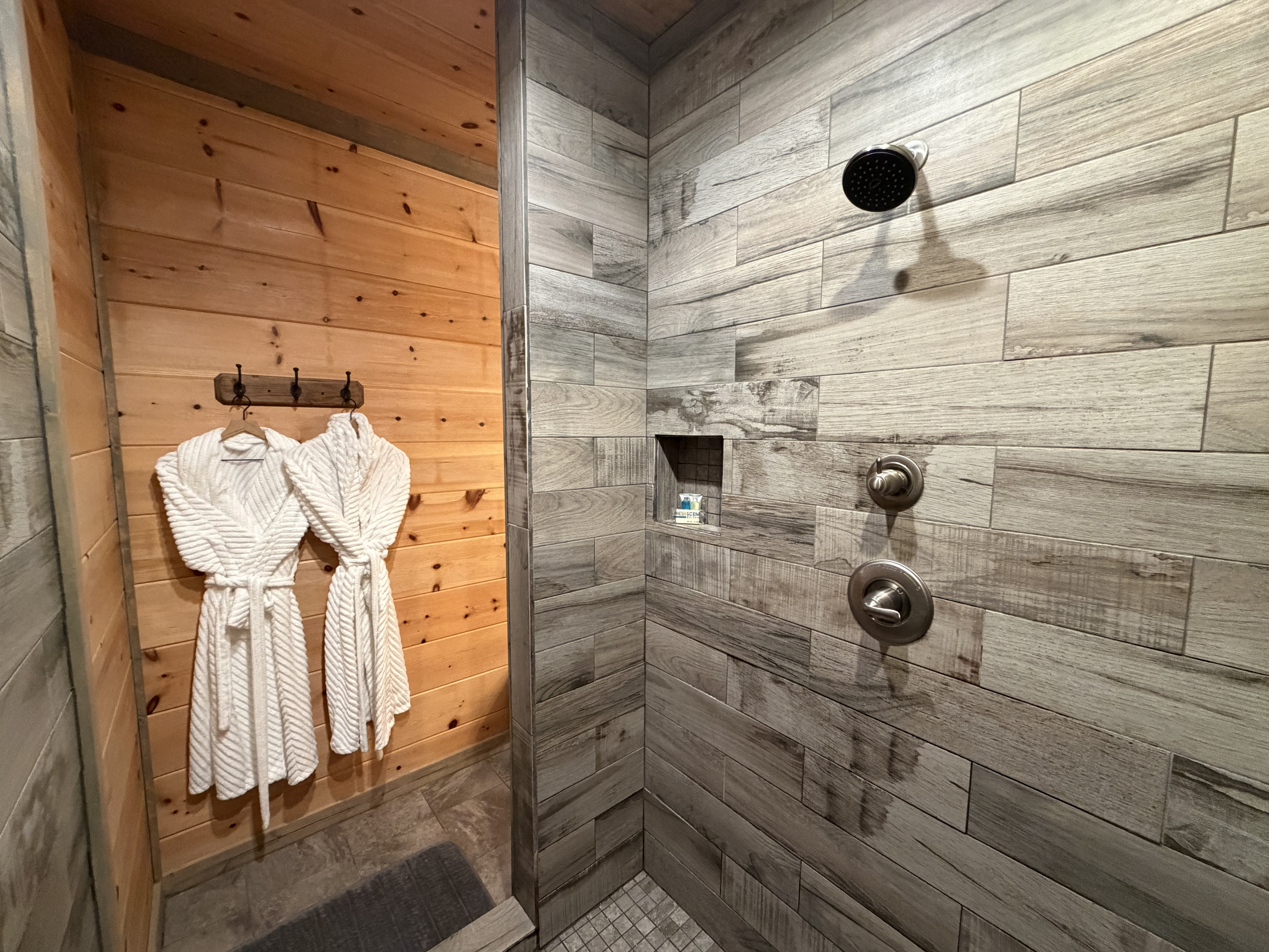 Downstairs Master bath with robes waiting.