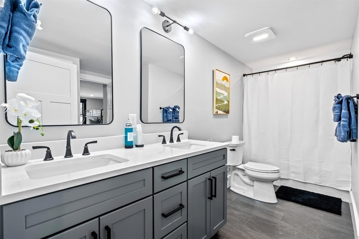 Basement bathroom bliss! This stylish space proves that even downstairs, you can have a spa-like retreat.
