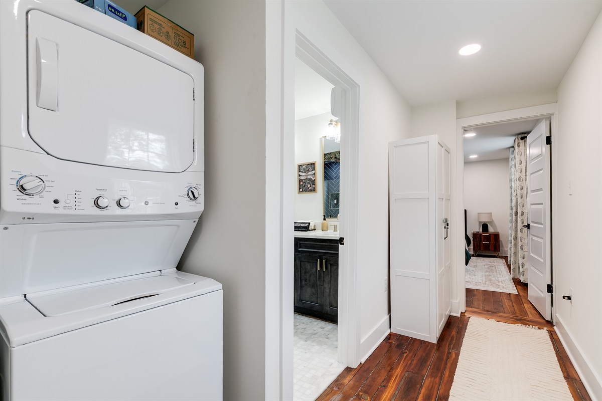 Laundry Area: Modern washer/dryer combo perfect for refreshing your vacation wardrobe!