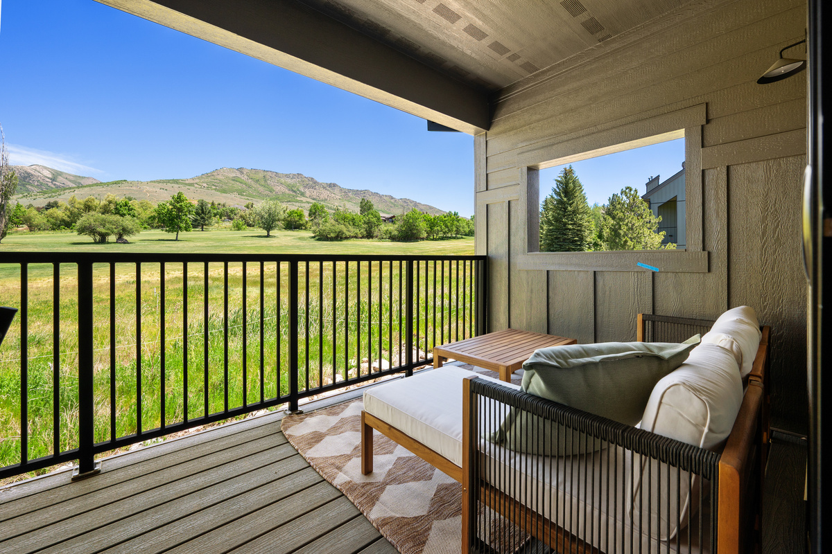 Mountain views provide a spectacular backdrop from the covered deck.