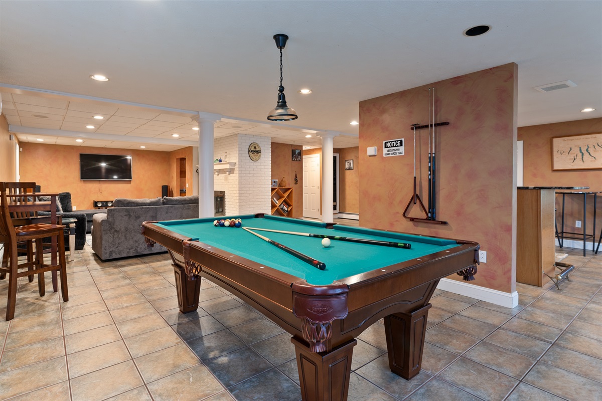 Lower level living room with bar and pool table