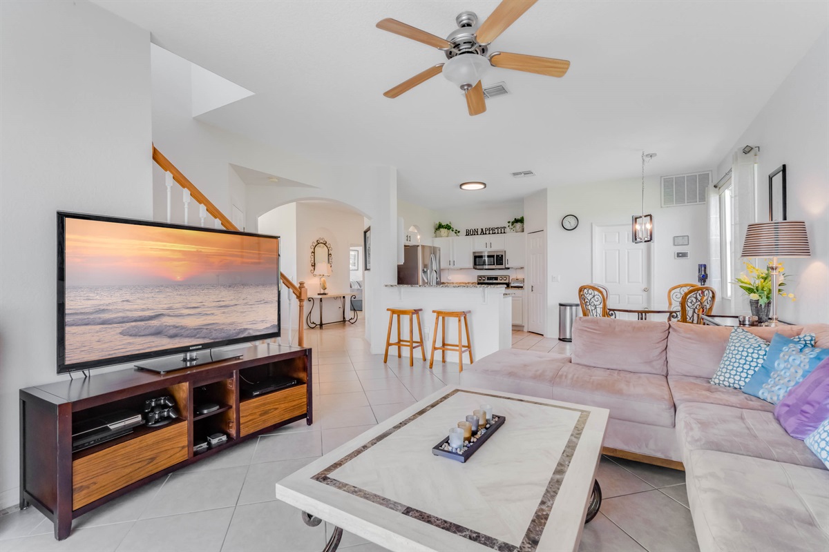 The 65 inch TV also has a PS4 attached!