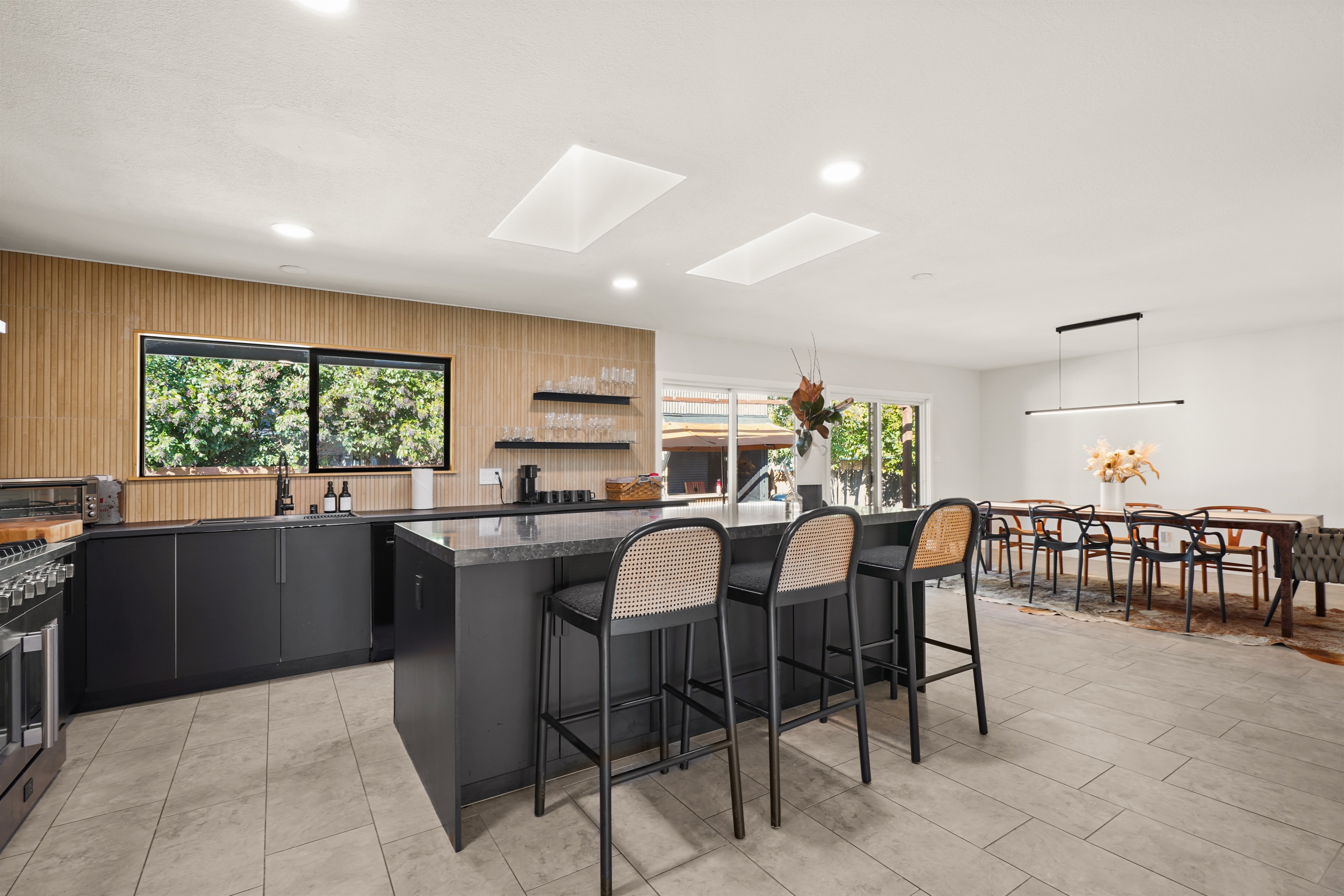 Fully equipped and thoughtfully designed, the kitchen features modern appliances, generous counter space, and everything needed to prepare meals during your stay.