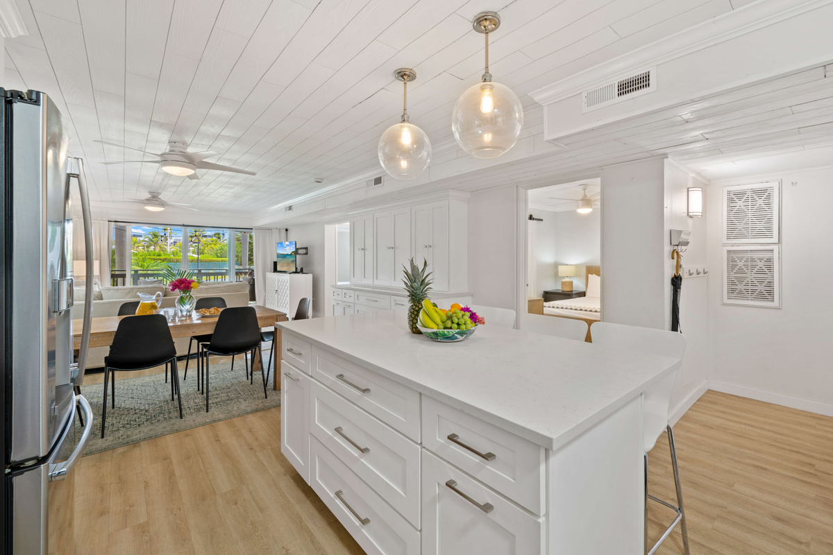 A welcoming kitchen island&mdash;perfect for coffee, cocktails, or conversation.
