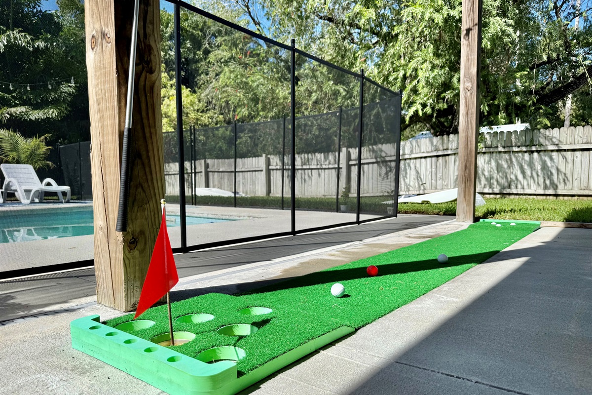 Mini-golf, cornhole, and plenty of space for outdoor play make this yard a hit for all ages.
