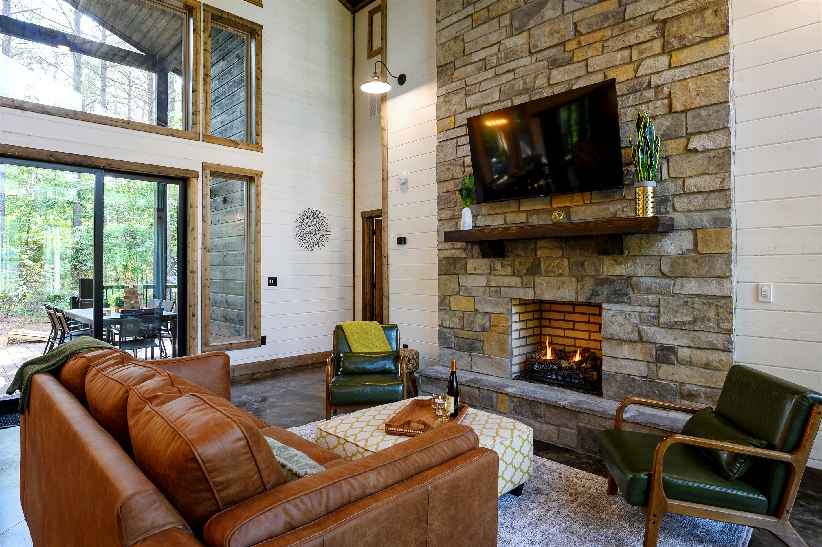 Bright living room with fireplace and scenic views