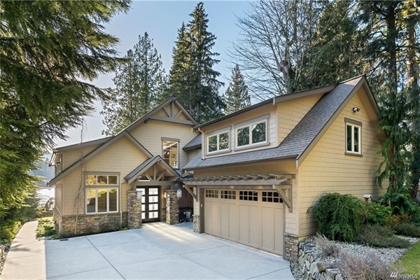 Upscale and secluded exterior, set in a serene location, featuring convenient guest garage access. Enjoy privacy and tranquility without sacrificing comfort and accessibility.