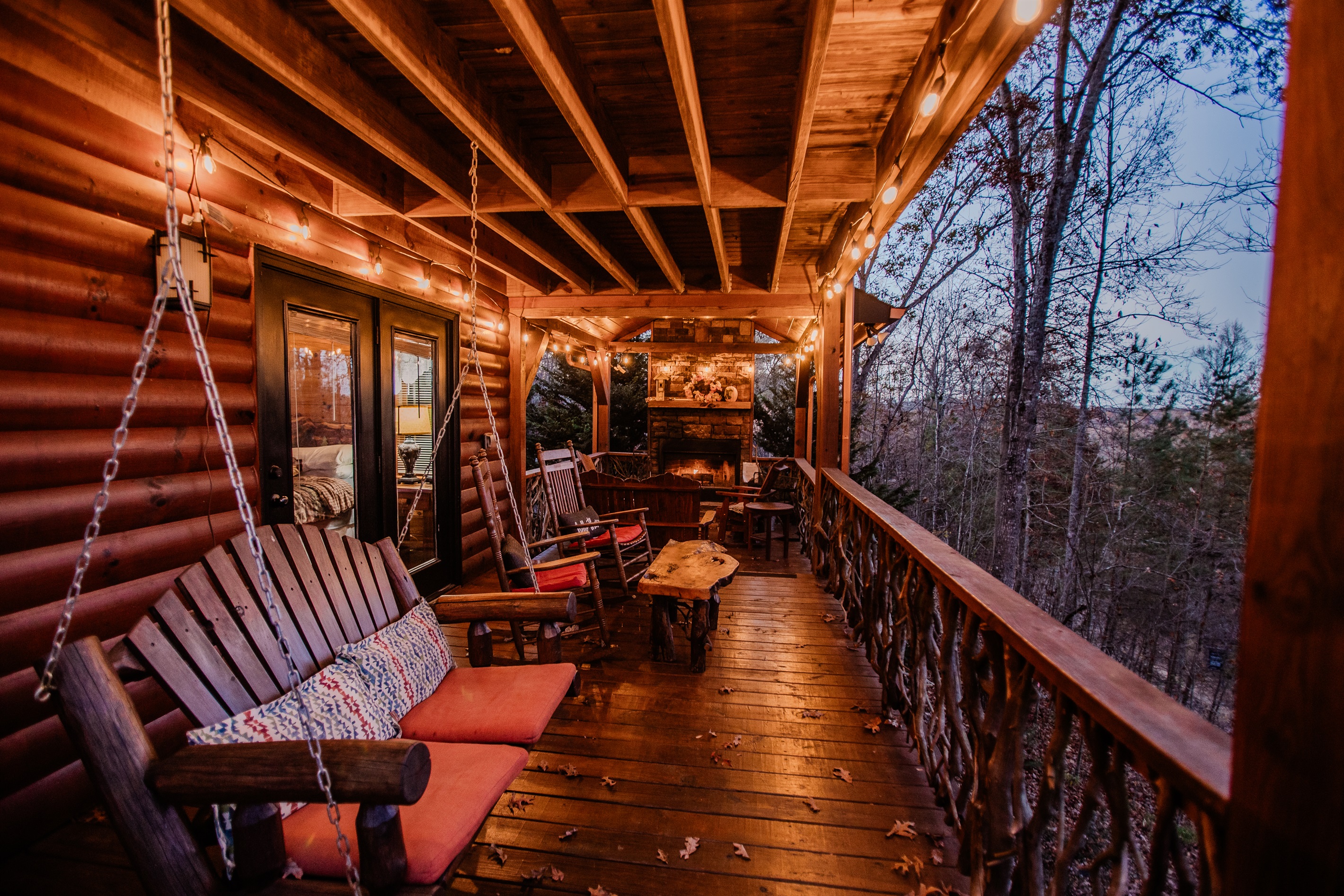 Plenty of outdoor seating with swing, rockers and other chairs.