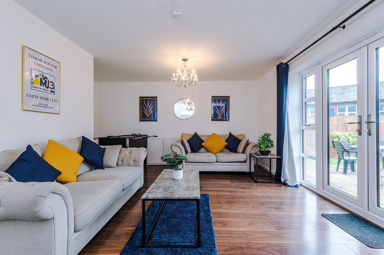 The spacious, bright and vibrant lounge benefits from a comfortable atmosphere and decor leading to the large rear garden via the French doors