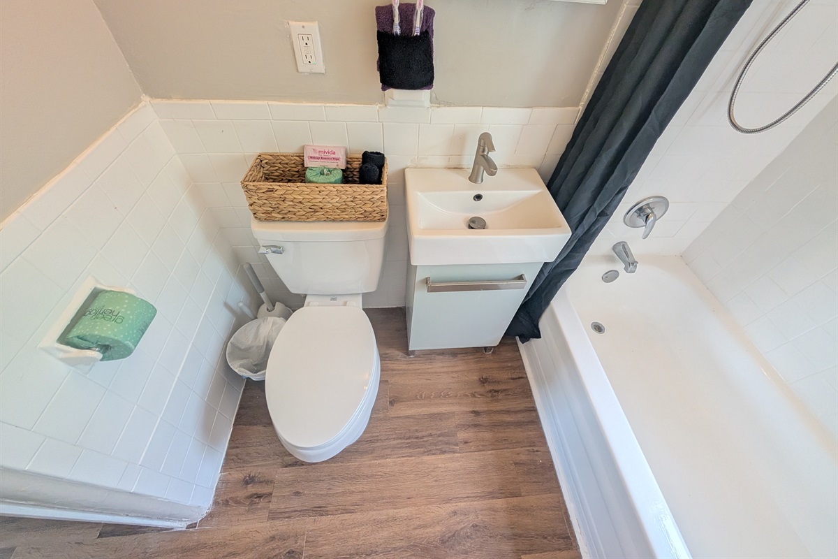 Bathroom with tub and shower