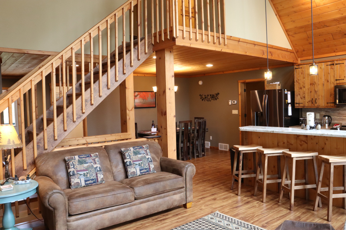 Living Room - View of Kitchen and Dining, Stairs to Upper Level