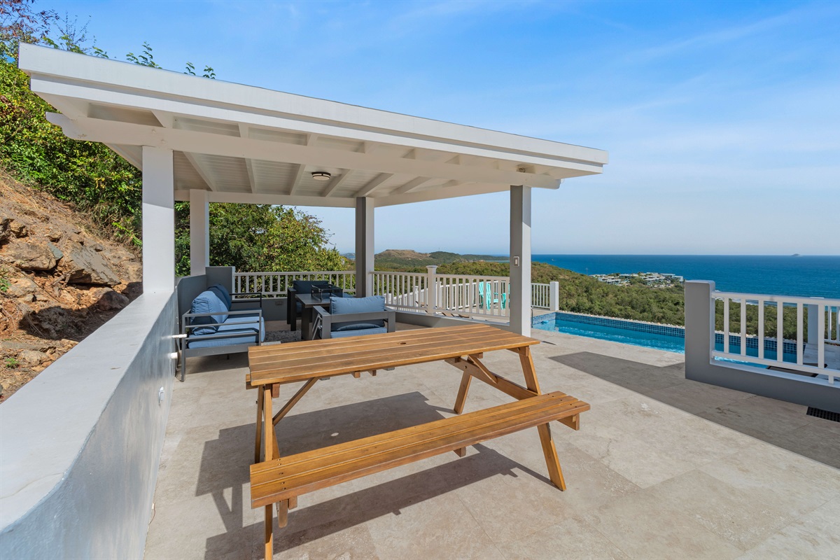 Gather friends for an al fresco dinner in this inviting outdoor area.
