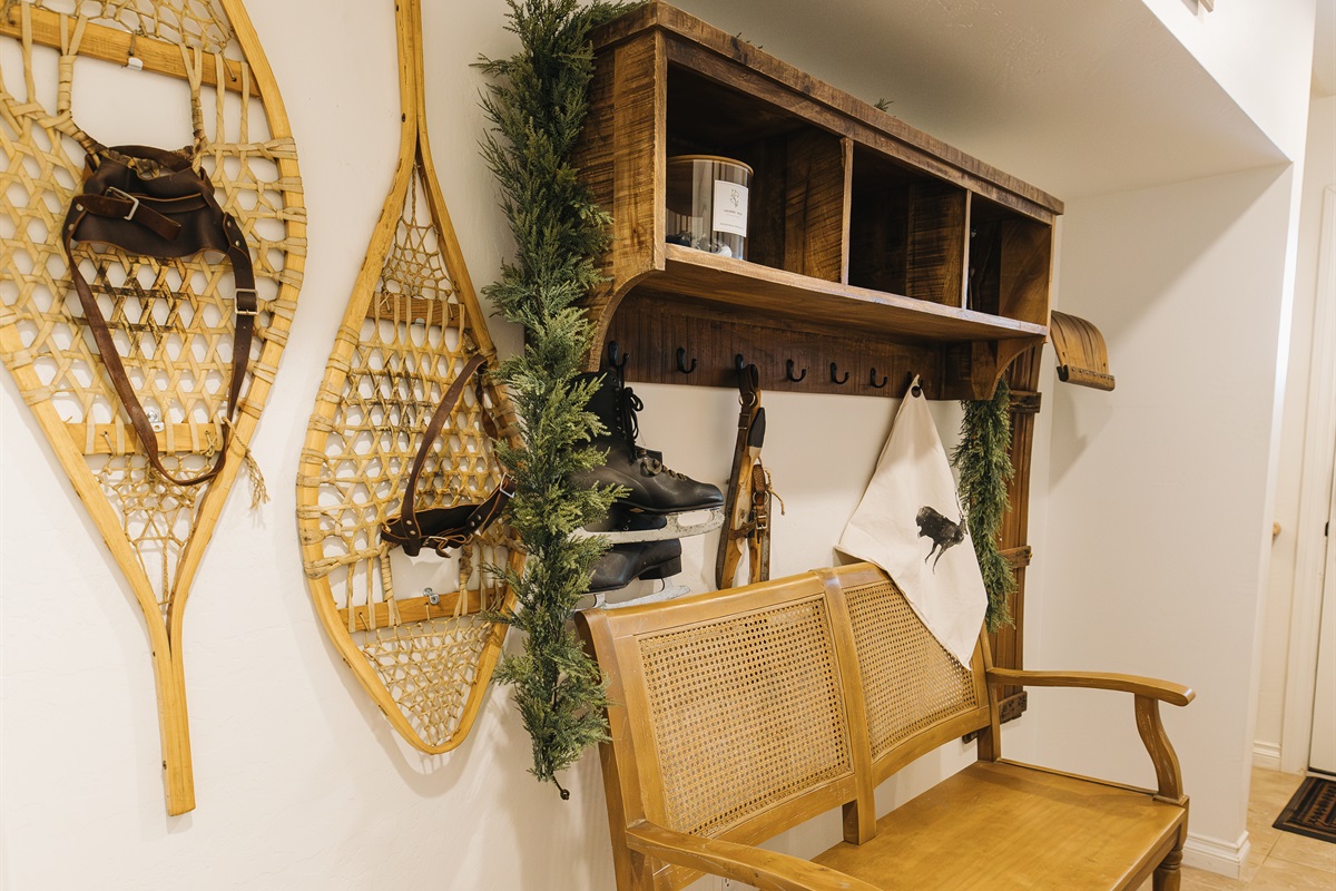 Welcoming entry with bench and storage for coats, boots, and ski gear. Designed for comfort and convenience, this cozy Pinetop condo is ideal for couples and families enjoying the White Mountains.