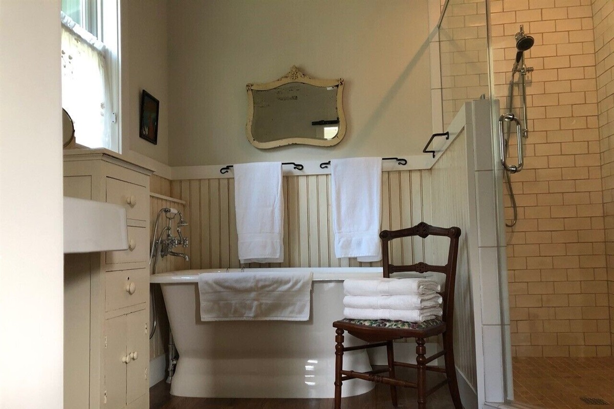 Bring your bubblebath for a great deep soak experience in the master clawfoot.
