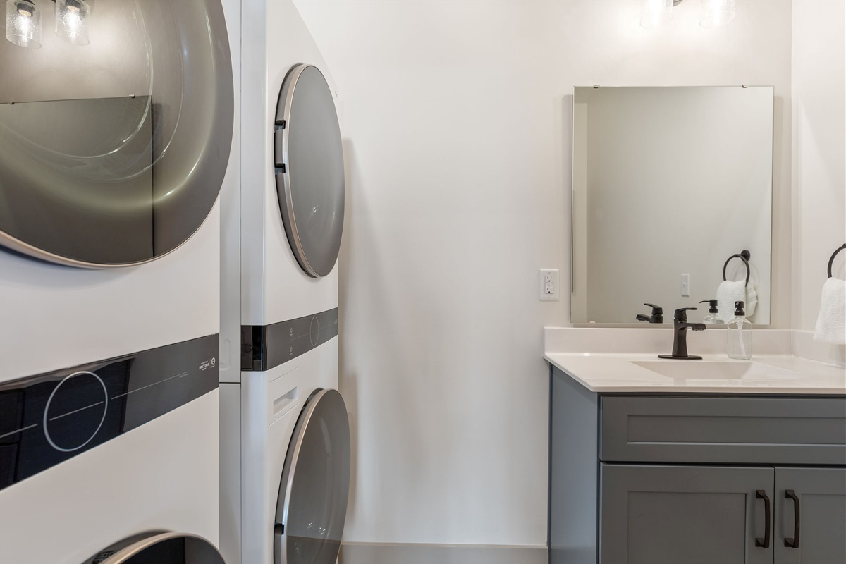 Double set of washers and dryers with bath off lower living room. Another set is located on the main level-for a total of 3 washers and 3 dryers!